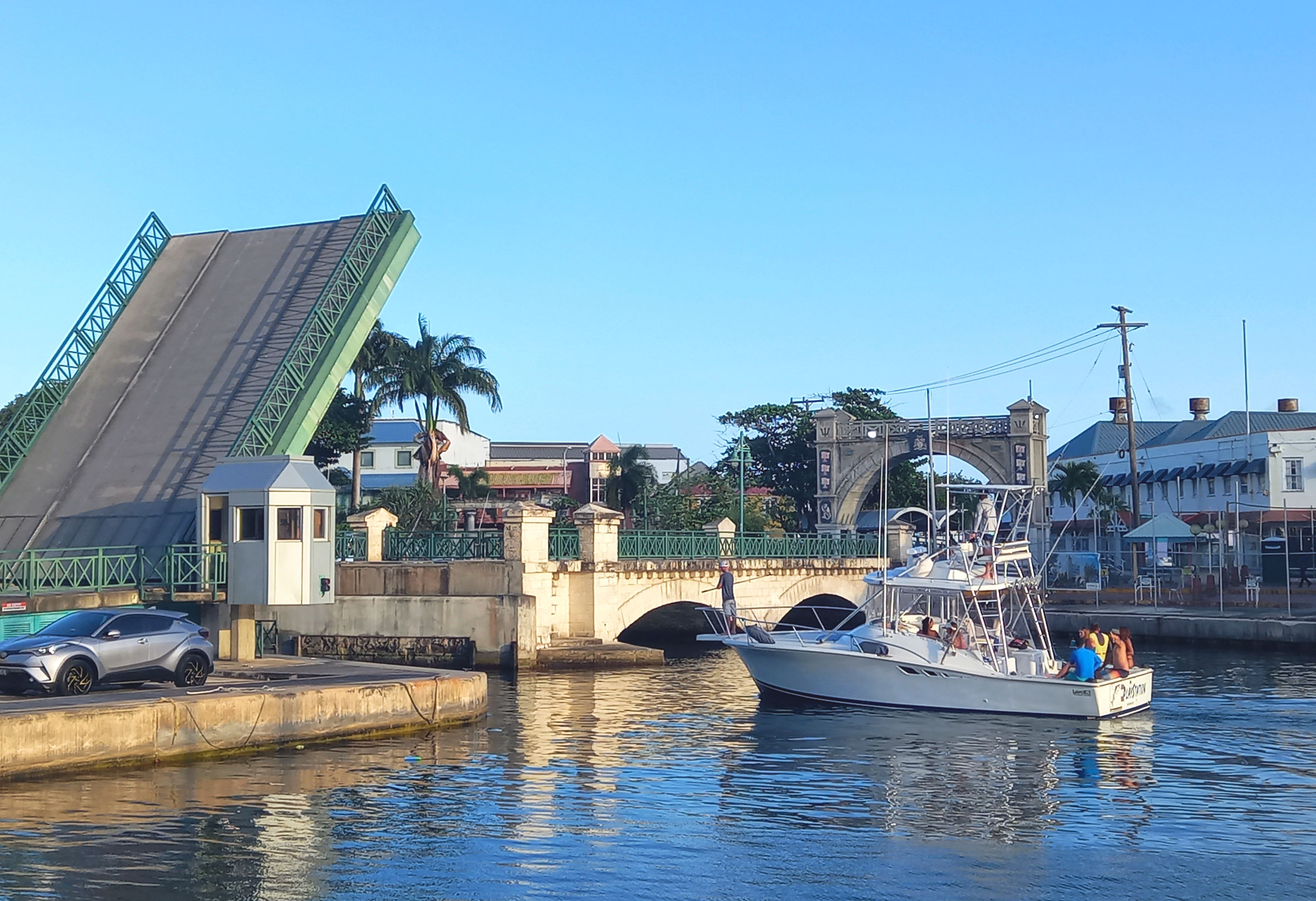 The Chamberlain Bridge being lifted to allow a fishing boat to enter the inner basin